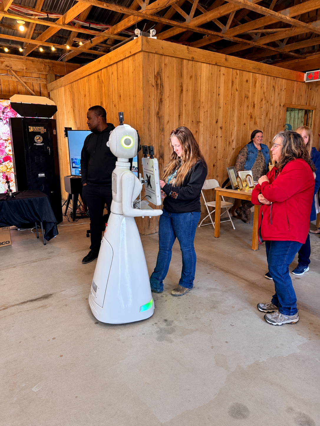 Guest interacting with Cinderella Robot Photobooth at an event