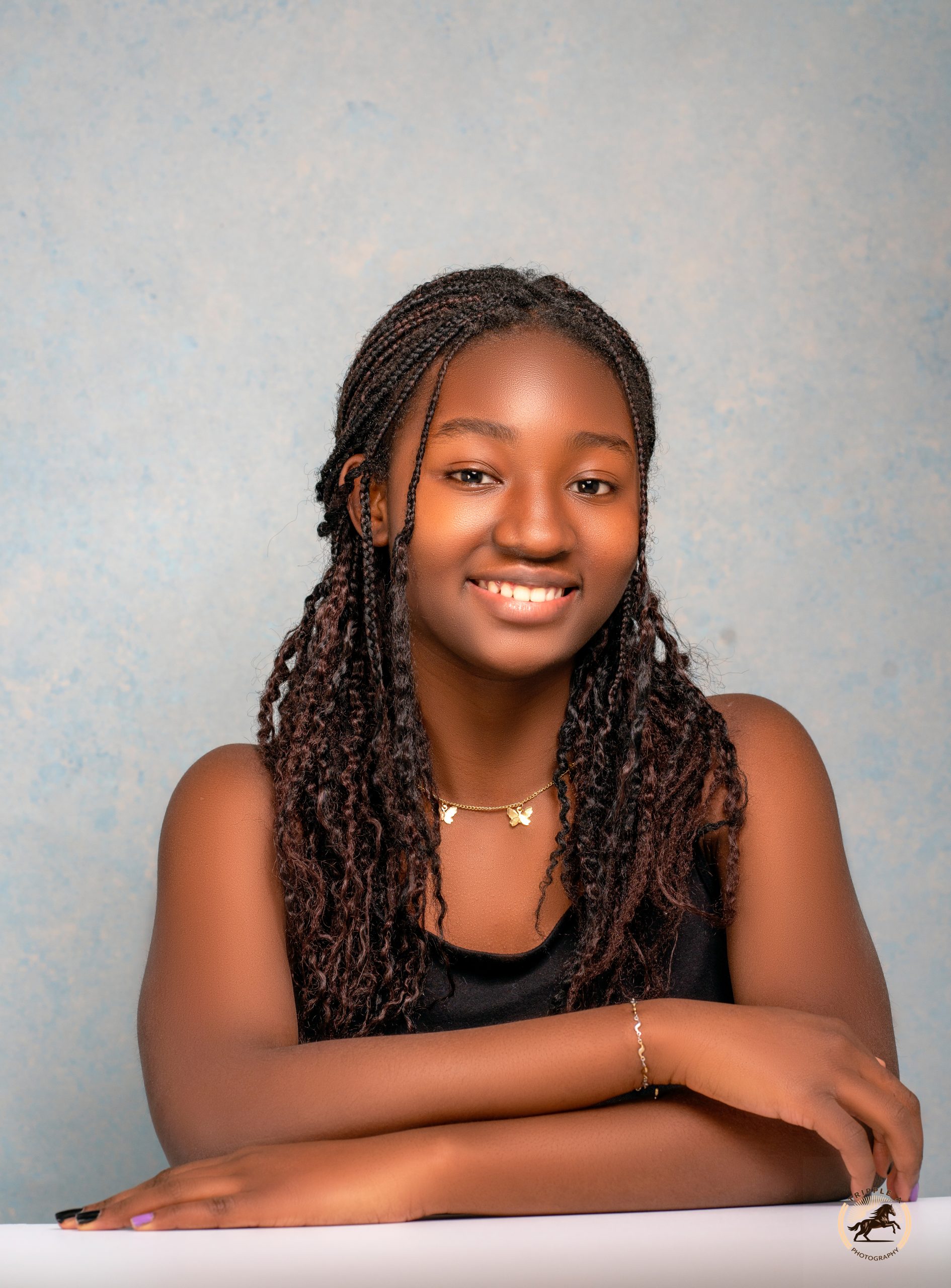 Studio portrait by Tripple A Photography